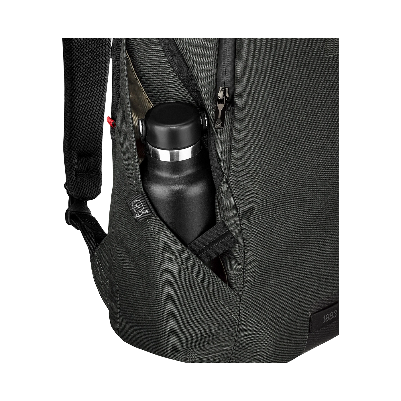 Close-up of a black backpack with a water bottle in the side pocket