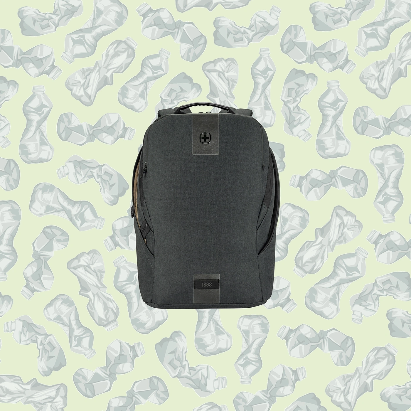 Black backpack in front of a background of crumpled plastic bottles.