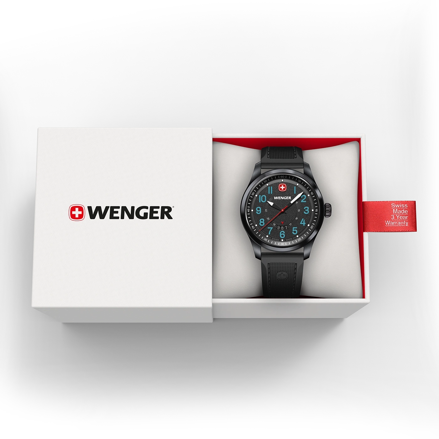 Wenger watch in box with red tag showing warranty information and Swiss made.