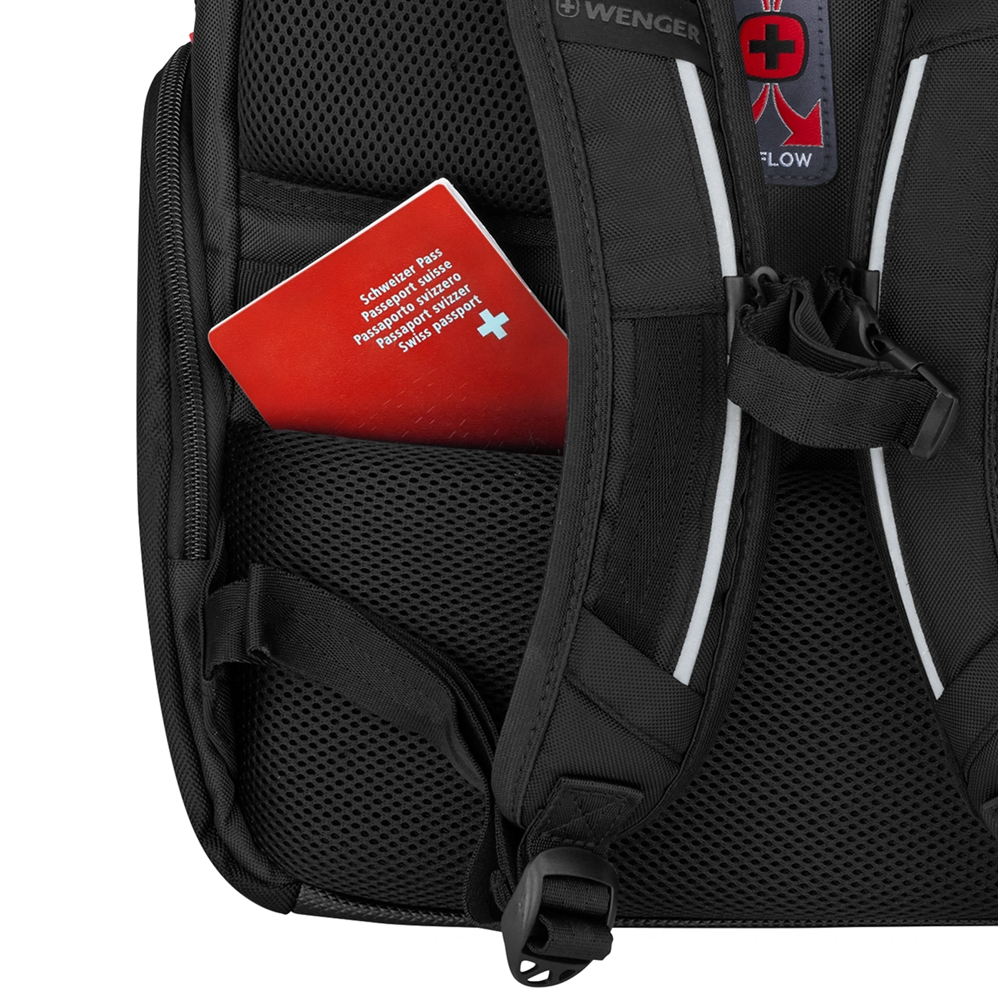 Close-up of a black backpack with a Swiss passport in the pocket.